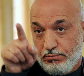 Afghan President Hamid Karzai speaks dur