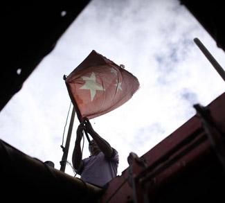 A Chinese fishing boat captain removes t