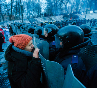 Ukraine protesters up against riot police