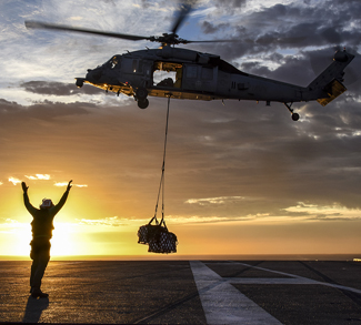 170107-N-BL637-082 PACIFIC OCEAN (Jan. 07, 2017) The aircraft carrier USS Carl Vinson (CVN 70) conducts a vertical replenishment-at-sea with the “Black Knights” of Helicopter Sea Combat Squadron (HSC) 4 and fleet replenishment oiler USNS Yukon (T-AO 202). The Carl Vinson Carrier Strike Group will report to U.S. 3rd Fleet, headquartered in San Diego, while deployed to the Western Pacific as part of the U.S. Pacific Fleet-led initiative to extend the command and control functions of 3rd Fleet into the region. (U.S. Navy photo by Mass Communication Specialist 2nd Class Sean M. Castellano/Released), public domain, https://www.defense.gov/Media/Photo-Gallery?igphoto=2001685812