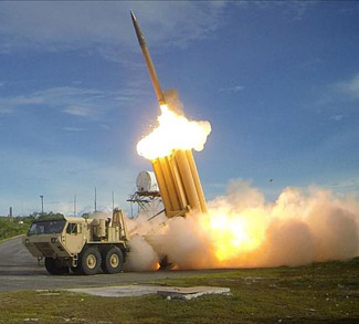 a US THAAD launcher, public domain, US Army - https://commons.wikimedia.org/wiki/File:The_first_of_two_Terminal_High_Altitude_Area_Defense_(THAAD)_interceptors_is_launched_during_a_successful_intercept_test_-_US_Army.jpg