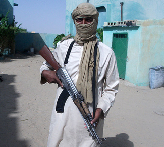 credit: Magharebia, modified, https://commons.wikimedia.org/wiki/File:Al-Qaida_cr%C3%A9e_une_brigade_dirig%C3%A9e_par_des_Touaregs_(8246938011).jpg, https://creativecommons.org/licenses/by/2.0/deed.en