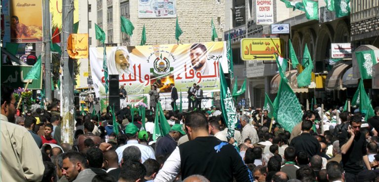 Hamas rally 2007, cc Wikicommons Hoheit (Â¿!), modified, https://commons.wikimedia.org/wiki/File:Yasin_Rantisi_Hamas_Wahlkampf.jpg