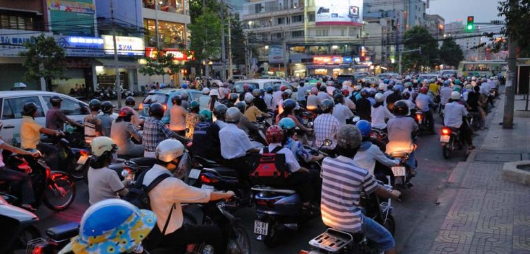 Rush hour traffic in Ho Chi Minh City, cc Flickr M M, modified, https://creativecommons.org/licenses/by-sa/2.0/