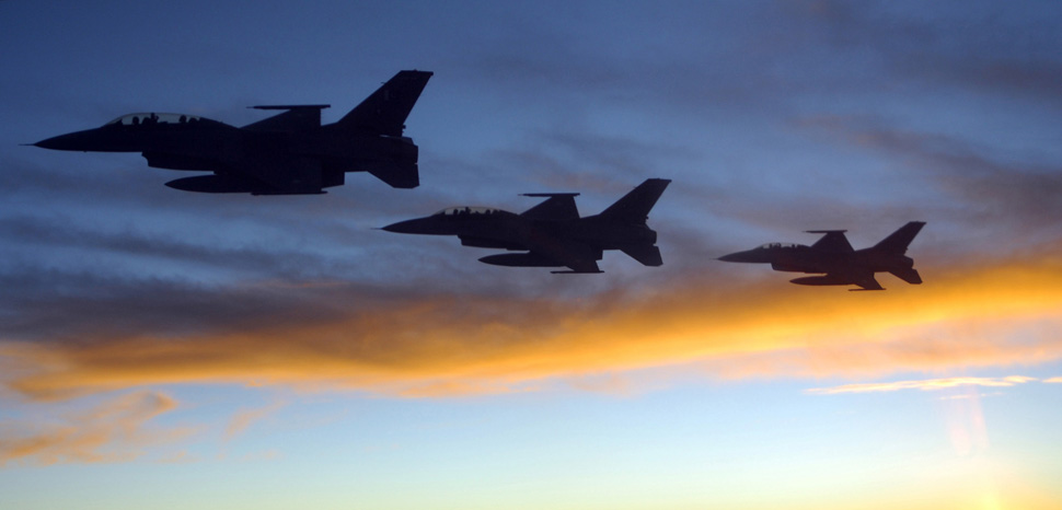 F-16s from the Pakistan Air Force fly near a KC-135 Stratotanker after refueling during an Exercise Red Flag mission July 21, 2010, at Nellis Air Force, Nev. Approximately 100 Pakistan Air Force F-16B pilots and support personnel are participating in Red Flag. (U.S. Air Force photo/Airman 1st Class Daniel Phelps) PAF at Red Flag, cc Flickr DVIDSHUB, modified,