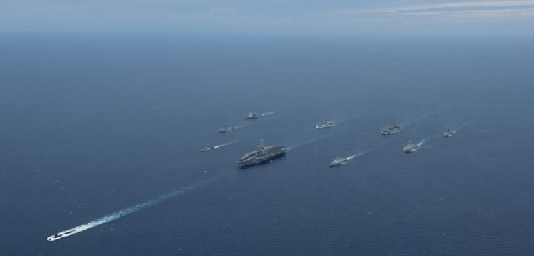Joint Malabar Exercises in 2012, modified, - The Nimitz-class aircraft carrier USS Carl Vinson (CVN 70), the Ticonderoga-class guided-missile cruiser USS Bunker Hill (CG 52), and the Arleigh Burke-class guided-missile destroyer USS Halsey (DDG 97) transit in formation with Indian navy ships during Exercise Malabar 2012. Carl Vinson, Bunker Hill, and Halsey are part of Carrier Strike Group 1, and are participating in the annual bilateral naval field training exercise with the Indian navy to advance multinational maritime relationships and mutual security issues. Unit: Navy Media Content Services DVIDS Tags: exercise; U.S. Navy; Bay of Bengal; Exercise Malabar 2012