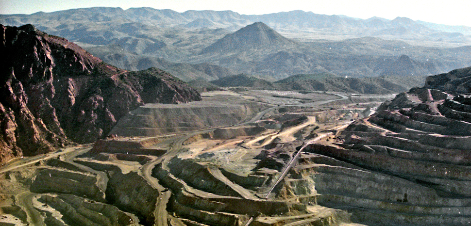 A strip mine near Globe Arizona, circa 1990; cc Flickr Phillip Capper, modified, https://creativecommons.org/licenses/by/2.0/