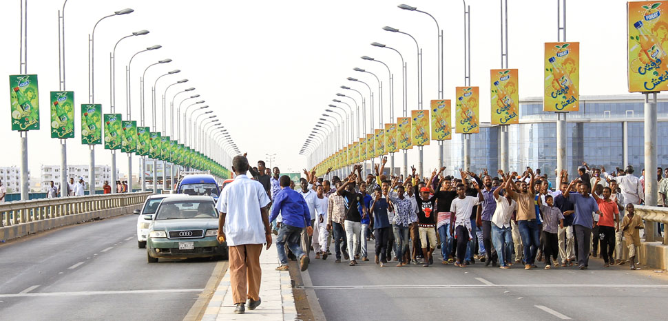 Sudan protests, cc Flickr Hind Mekki, modified, https://creativecommons.org/licenses/by/2.0/