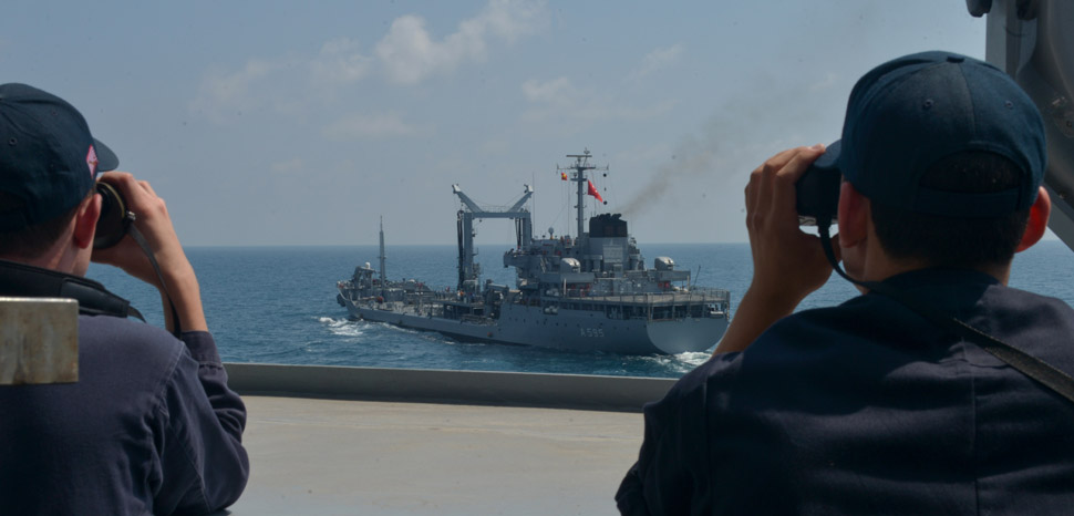 cc Flickr Commander, U.S. Naval Forces Europe-Africa/U.S. 6th Fleet, modified, 170819-N-QR145-042 BLACK SEA (Aug. 19, 2017) Sailors aboard Arleigh Burke-class guided-missile destroyer USS Porter (DDG 78)look out to Turkish replenishment oiler TCG YB. Kudret (A 595) while making an approach to conduct a replenishment-at-sea in the Black Sea Aug. 19, 2017. Porter, forward-deployed to Rota, Spain, is conducting naval operations in the U.S. 6th Fleet area of operations in support of U.S. national security interests in Europe. (U.S. Navy photo by Mass Communication Specialist 3rd Class Krystina Coffey/ Released)