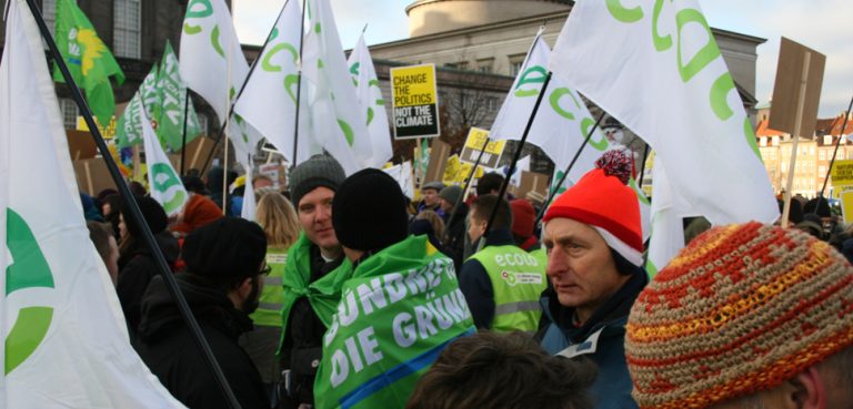 cc Wikicommons greens_climate, modified, https://commons.wikimedia.org/wiki/File:Green_bloc_at_the_Copenhagen_climate_demo_Belgium_and_Germany_(4186296278).jpg