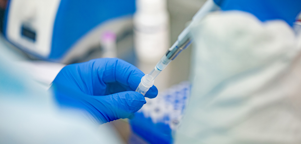 Pennsylvania Commonwealth microbiologist Kerry Pollard performs a manual extraction of the coronavirus inside the extraction lab at the Pennsylvania Department of Health Bureau of Laboratories on Friday, March 6, 2020. / cc Governor Tom Wolf, Flickr, modified, https://creativecommons.org/licenses/by/2.0/